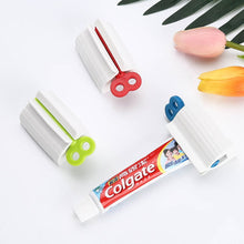 Load image into Gallery viewer, Rolling Toothpaste Squeezer
